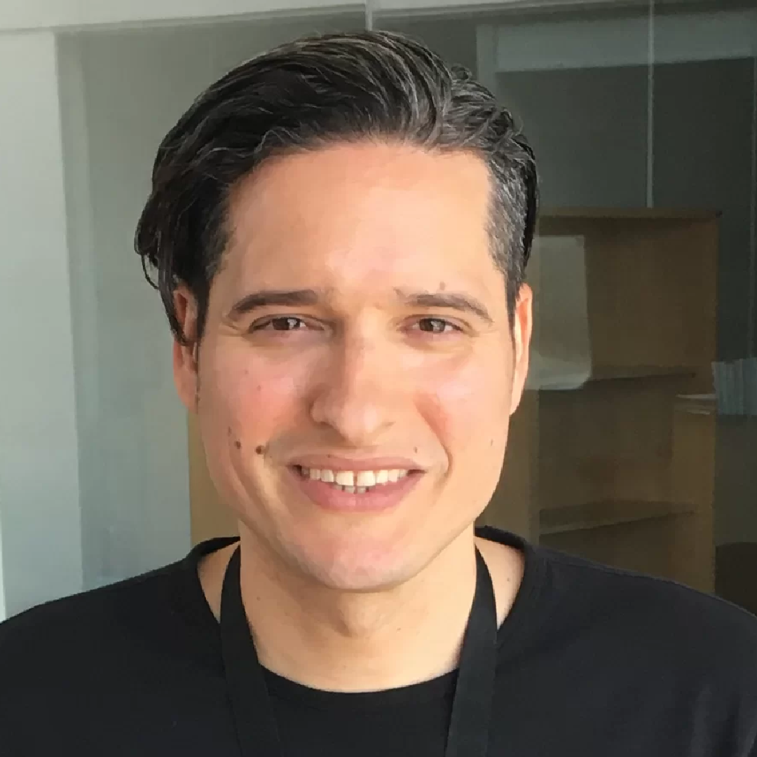 man smiling at the camera